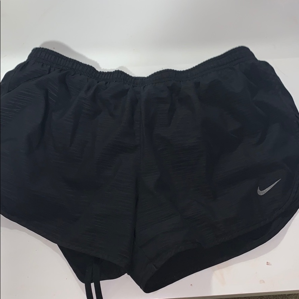 Black Nike running shorts